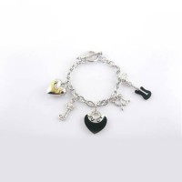 Juicy Couture Jewelry Black Heart & Chic Bow Silver Bracelet Juicy Couture Jewelry Black Heart & Chic Bow Silver Bracelet